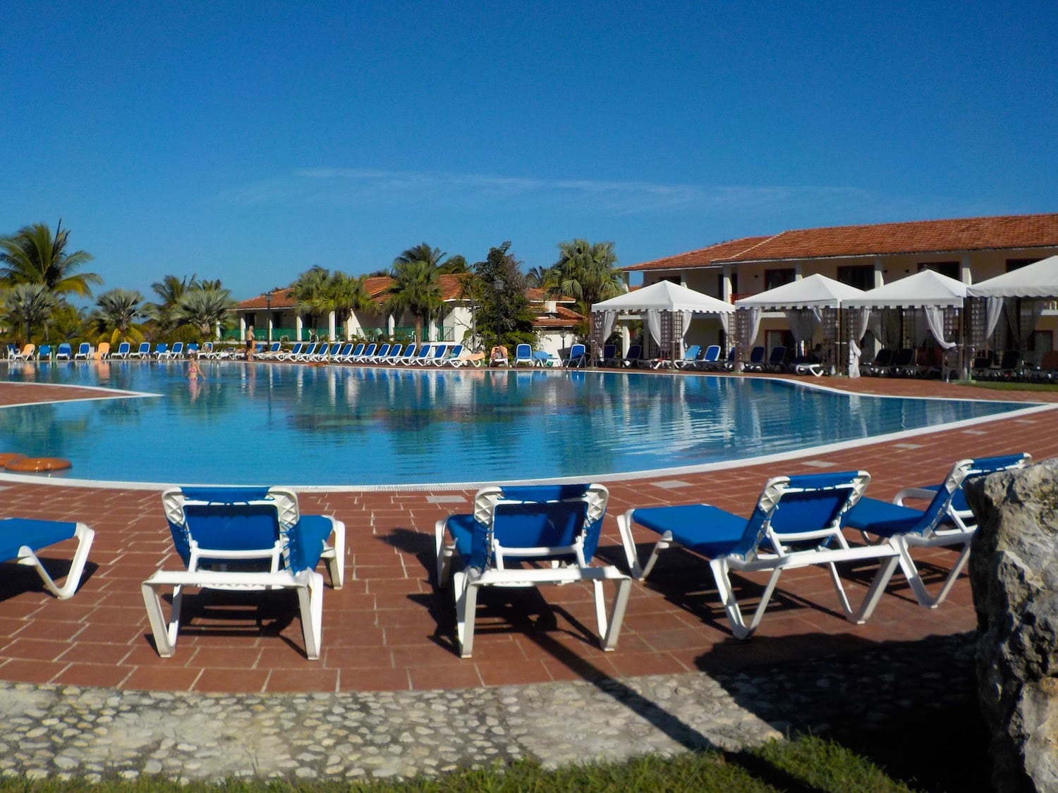 The pool surrounded by loungers at our all-inclusive vacation resort in Cuba