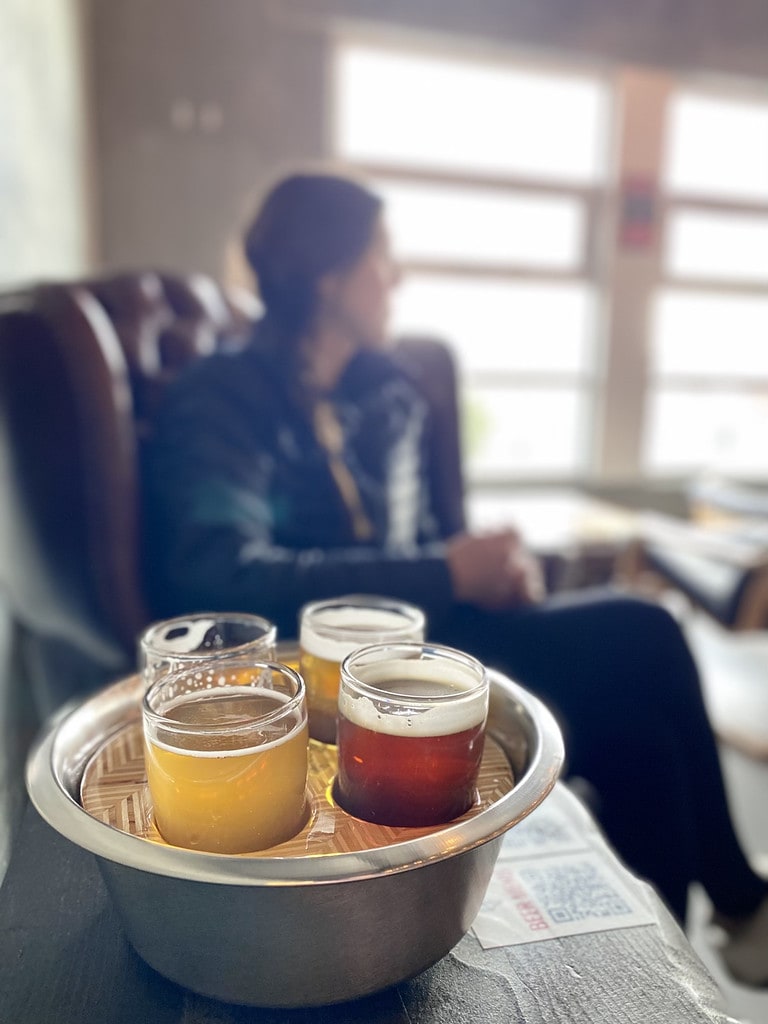 Enjoying a Flight of Beers at Unleashed Brewing